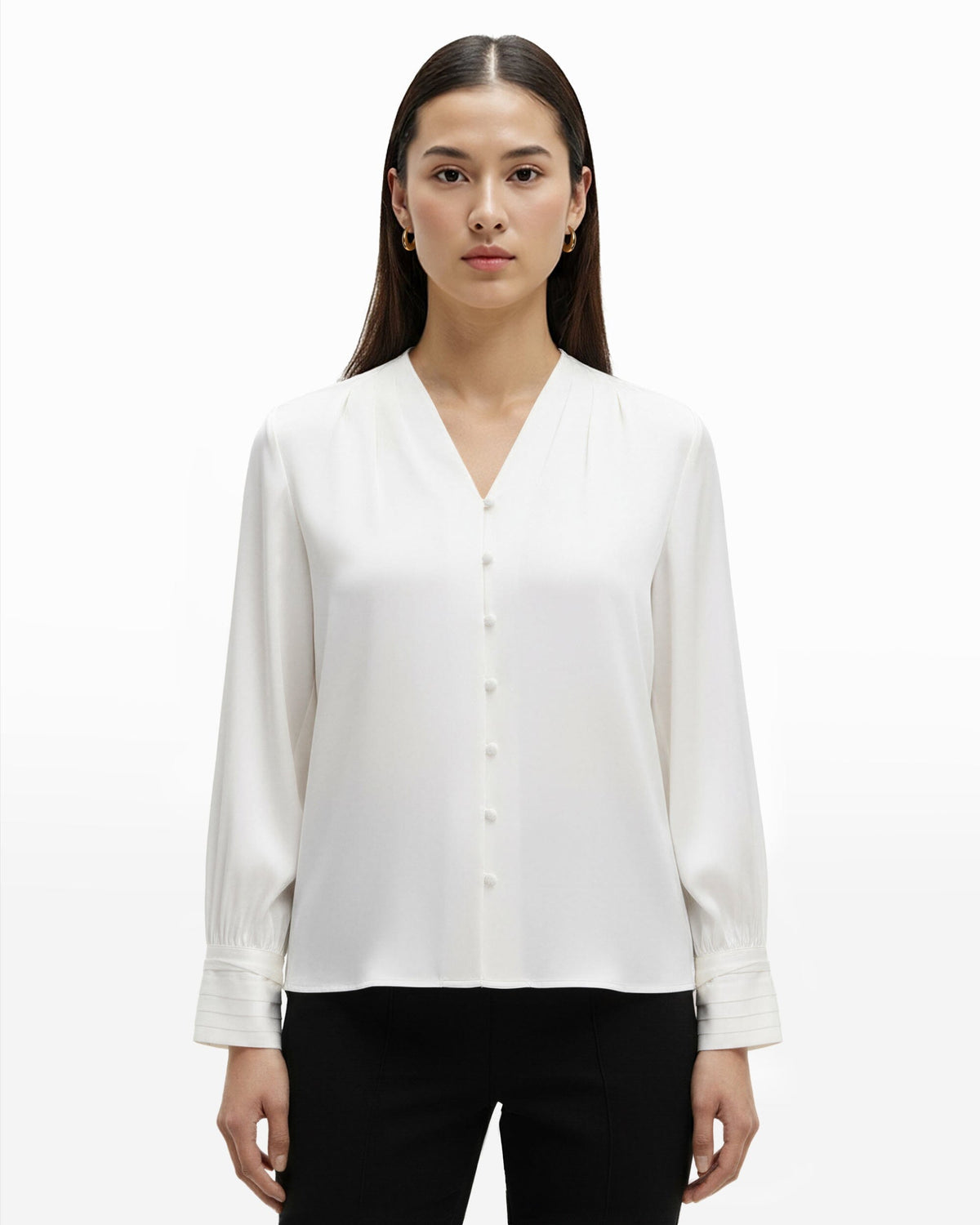 Haut à col en V et poignets plissés