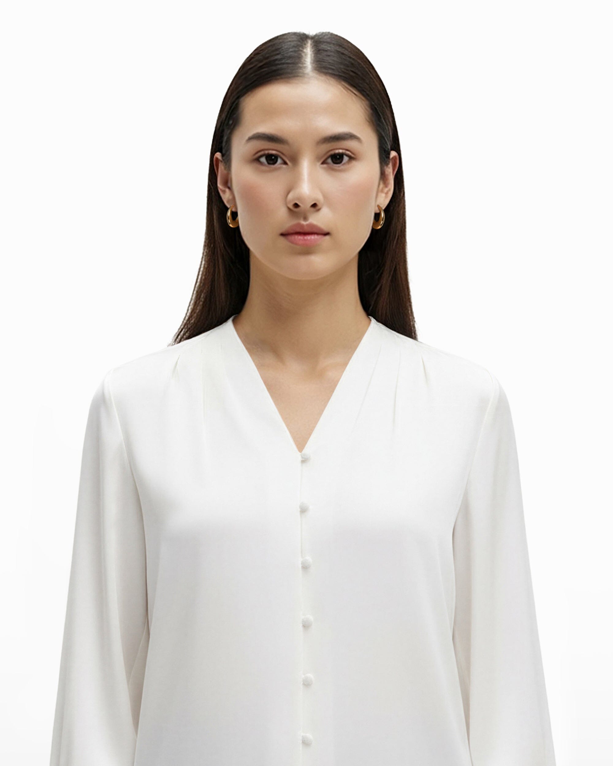 Haut à col en V et poignets plissés