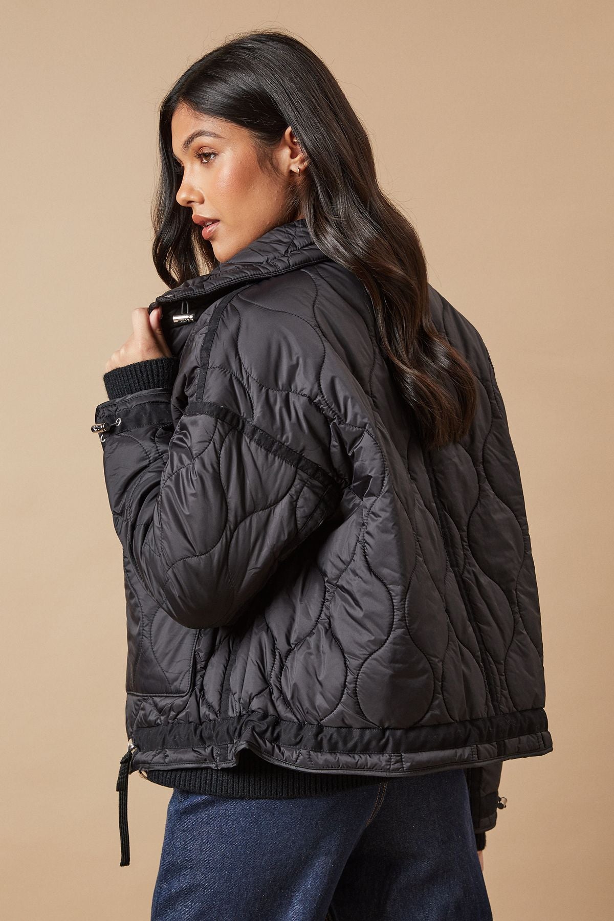 Veste matelassée femme beige – Col montant & cordons ajustables